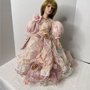 Duck House porcelain doll 17” lace ruffle dress beaded necklace comes with stand